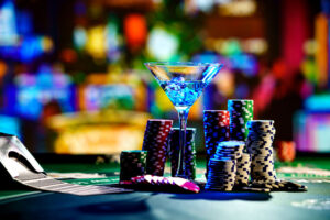 cocktail-glass-on-the-casino-gambling-table - slot machines - real action slots