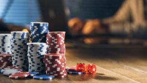 poker chips on a table - progressive jackpot slots - winning money - real action slots