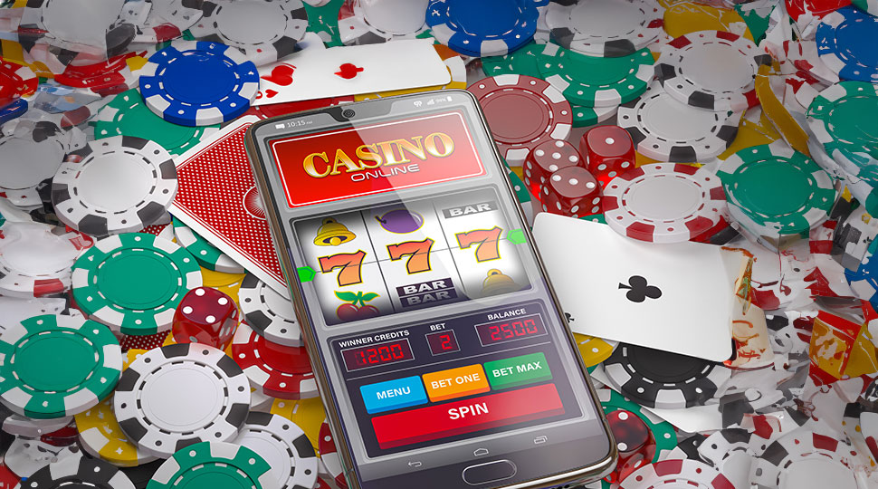 mobile slot social responsibility - cell phone with slot game on pile of cash - real action slots